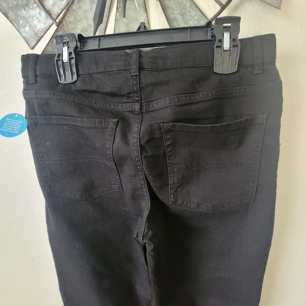 The children place Black super skinny jeans size 16 Husky.